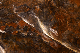 Höhlenwand- Vulkan- Stein/9399798