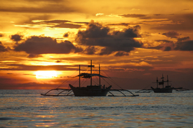 Traditionelle Boote und Schiffe Asien bei Sonnenuntergang/11231292