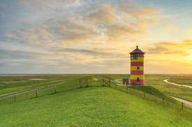 Sonnenaufgang beim Pilsumer Leuchtturm - 12738497 /leinwand/bigthumb/12738497.jpg