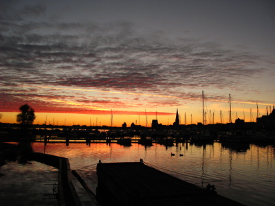 Bild-Nr: 9491556 Sonnenaufgang über Rostock Erstellt von: eagle2eye