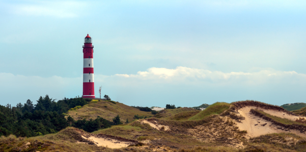 Bild-Nr: 10860760 Amrum - Leuchtturm in Dünenlandschaft Erstellt von: Reiner Würz