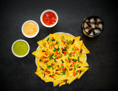 Bild-Nr: 11905184 Tortilla Chips mit saucen und Cola Erstellt von: xfotostudio