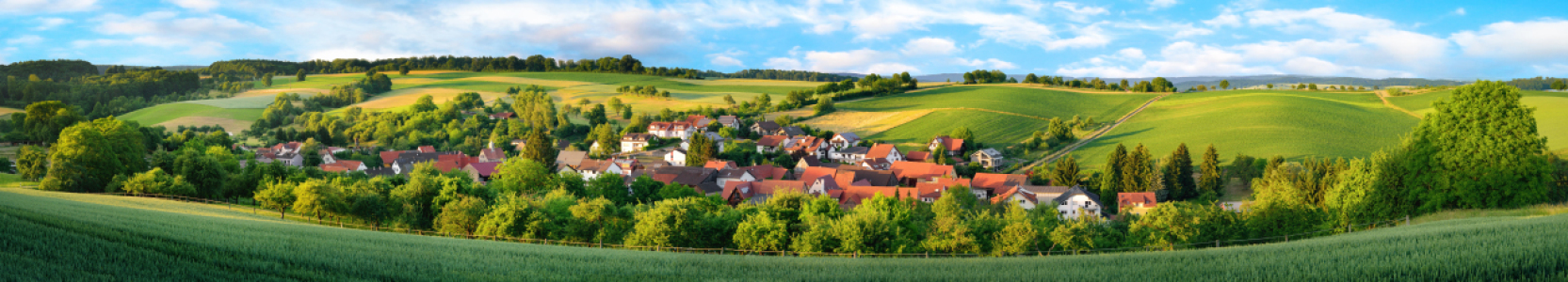 Bild-Nr: 12171466 Ortschaft und grüne Hügel - extra breites Panorama Erstellt von: Smileus