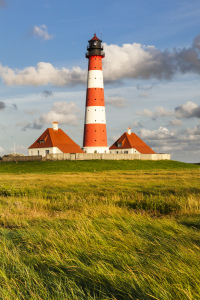 Bild-Nr: 12438269 Leuchtturm Westerheversand bei Sonnenuntergang Erstellt von: KundenNr-360966